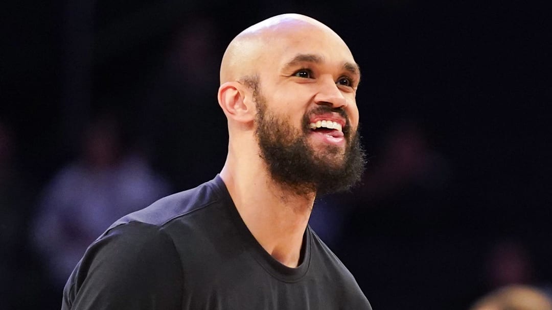 Apr 9, 2026; New York, New York, USA; Boston Celtics guard Derrick White (9) smiles as he warms up before the game against the New York Knicks at Madison Square Garden. Mandatory Credit: Lucas Boland-Imagn Images