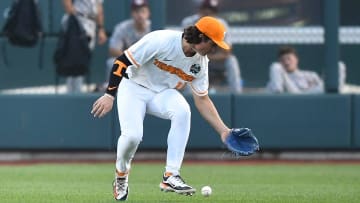 Tennessee's Reese Chapman (13) in the outfield during a NCAA College World Series game between Tennessee and Texas A&M at Charles Schwab Field in Omaha, Neb., on Saturday, June 22, 2024.