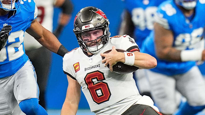 Tampa Bay Buccaneers quarterback Baker Mayfield (6) slides for a first down against Detroit Lions during the first half at Ford Field in Detroit on Sunday, September 15, 2024.