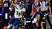 Nov 16, 2025; Inglewood, California, USA; Seattle Seahawks wide receiver Jaxon Smith-Njigba (11) against Los Angeles Rams cornerback Emmanuel Forbes Jr. (1) during the second half at SoFi Stadium. 