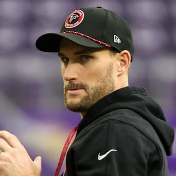 Dec 8, 2024; Minneapolis, Minnesota, USA; Atlanta Falcons quarterback Kirk Cousins (18) warms up before the game against the Minnesota Vikings at U.S. Bank Stadium. Mandatory Credit: Matt Krohn-Imagn Images