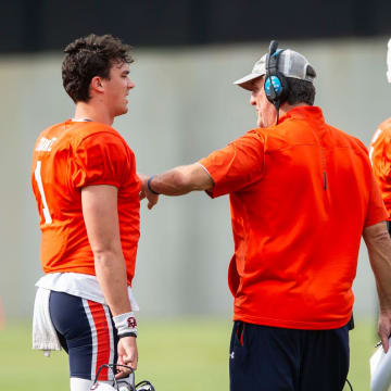 Kent Austin moves to the field as quarterback coach in his second season with Auburn.