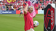  TV host Andy Cohen delivers the match ball prior to a match between St. Louis CITY SC and the LA Galaxy at Energizer Park. 