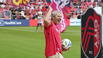  TV host Andy Cohen delivers the match ball prior to a match between St. Louis CITY SC and the LA Galaxy at Energizer Park. 