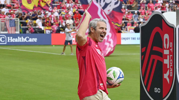 TV host Andy Cohen delivers the match ball prior to a match between St. Louis CITY SC and the LA Galaxy at Energizer Park. TV host Andy Cohen delivers the match ball prior to a match between St. Louis CITY SC and the LA Galaxy at Energizer Park.