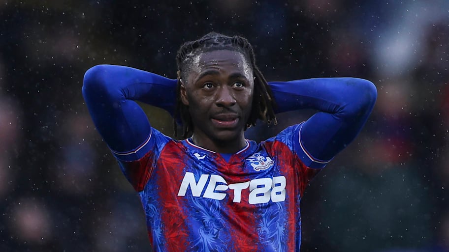 Eberechi Eze with his hands on head.