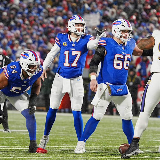 Buffalo Bills quarterback Josh Allen points to something he sees in the Ravens lineup