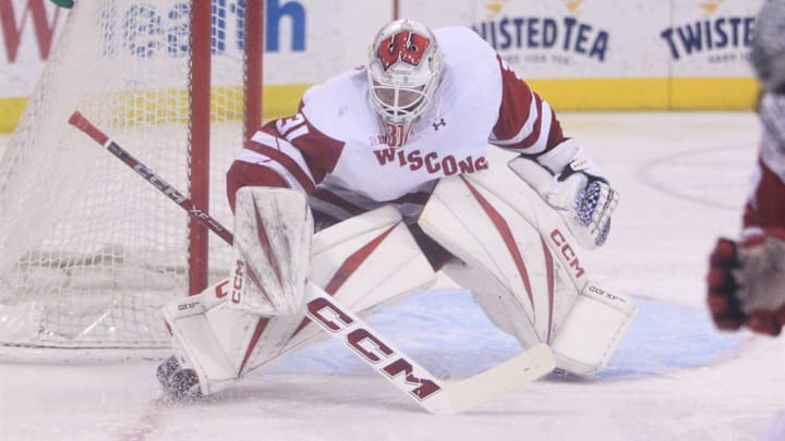 Wisconsin goaltender Daniel Hauser guards the net in a Big Ten quarterfinal at the Kohl Center in Madison, Wis. on March 11. 2026. Ohio State won, 7-1.