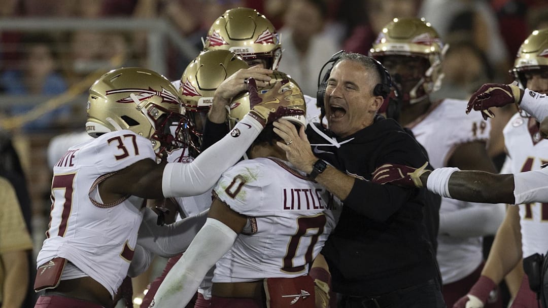 Oct 18, 2025; Stanford, California, USA;  Florida State Seminoles head coach Mike Norvell celebrates with defensive back Earl Little Jr. (0) during the first quarter against the Stanford Cardinal at Stanford Stadium. Mandatory Credit: Stan Szeto-Imagn Images
