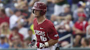 Arkansas Razorbacks slugger Andrew Benintendi rounds the bases after hitting a home run against the Virginia Cavaliers in the 2015 College World Series in Omaha, Neb. Virginia beat the Hogs 5-3 and topped Vanderbilt in the championship round for its only national championship.