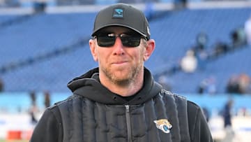 Nov 30, 2025; Nashville, Tennessee, USA;  Jacksonville Jaguars head coach Liam Coen smiles to the crowd as he walks of the field against the Tennessee Titans during the second half at Nissan Stadium. Mandatory Credit: Steve Roberts-Imagn Images
