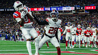 Dec 1, 2025; Foxborough, Massachusetts, USA; New England Patriots wide receiver Kayshon Boutte (9) catches a pass for a touchdown against New York Giants cornerback Cor'Dale Flott (28) during the first quarter at Gillette Stadium.  