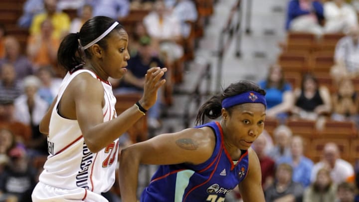 July 20, 2010; Uncasville, CT, USA; New York Liberty guard Cappie Pondexter (23) drives the ball around Connecticut Sun guard Renee Montgomery (21) during the second half at the Mohegan Sun Arena. Liberty defeated the Sun 82-74. Mandatory Credit: David Butler II-Imagn Images