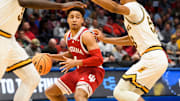 Indiana's Rob Phinisee (1) looks for an open teammate during the Indiana versus Wyoming NCAA First Four tournament game at University of Dayton Arena on Tuesday, March 15, 2022.