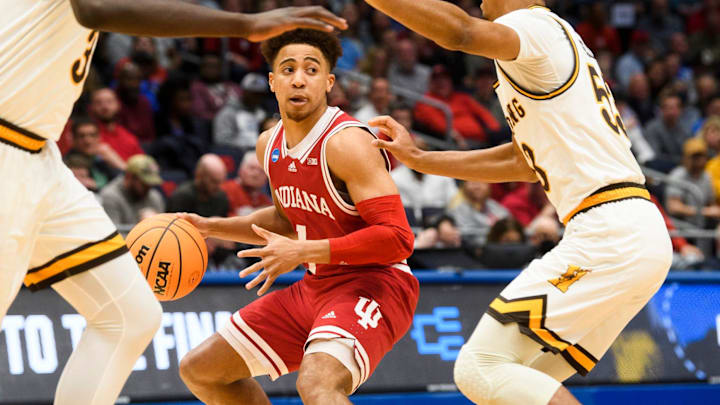 Indiana's Rob Phinisee (1) looks for an open teammate during the Indiana versus Wyoming NCAA First Four tournament game at University of Dayton Arena on Tuesday, March 15, 2022. Indiana's Rob Phinisee (1) looks for an open teammate during the Indiana versus Wyoming NCAA First Four tournament game at University of Dayton Arena on Tuesday, March 15, 2022.