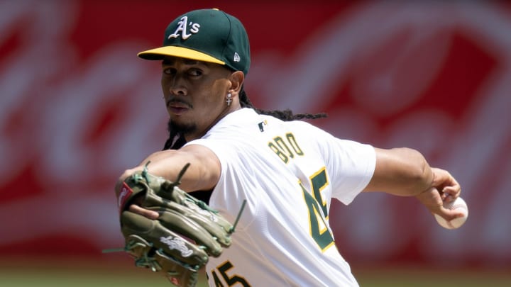 Aug 22, 2024; Oakland, California, USA; Oakland Athletics starting pitcher Osvaldo Bido (45) delivers a pitch against the Tampa Bay Rays during the first inning at Oakland-Alameda County Coliseum. Mandatory Credit: D. Ross Cameron-USA TODAY Sports