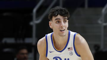 Nov 18, 2024; Pittsburgh, Pennsylvania, USA;  Pittsburgh Panthers forward Jorge Diaz Graham (31) dribbles the ball against the Virginia Military Keydets during the second half at the Petersen Events Center. Mandatory Credit: Charles LeClaire-Imagn Images