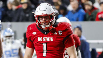 Nov 29, 2025; Raleigh, North Carolina, USA;  NC State Wolfpack linebacker Caden Fordham (1) celebrates a down during the first half of the game against the North Carolina Tar Heels at Carter-Finley Stadium.  Mandatory Credit: Jaylynn Nash-Imagn Images