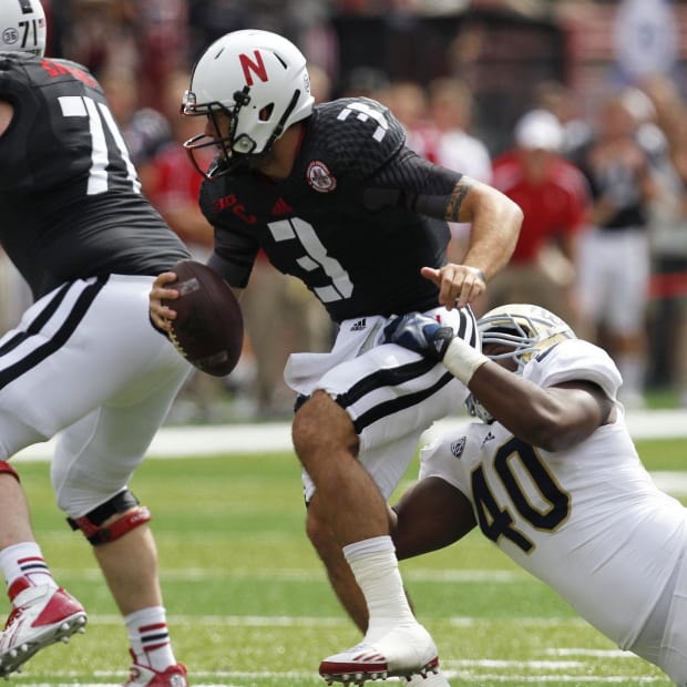 The Huskers wore black jerseys against UCLA in 2013.