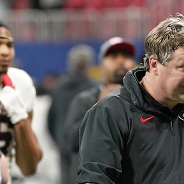 Dec 2, 2023; Atlanta, GA, USA; Georgia Bulldogs head coach Kirby Smart walks off the field after losing to the Alabama Crimson Tide in the SEC Championship game at Mercedes-Benz Stadium. Mandatory Credit: Dale Zanine-Imagn Images