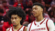 Mar 9, 2025; Piscataway, New Jersey, USA; Rutgers Scarlet Knights guard Dylan Harper (2) and Rutgers Scarlet Knights guard Ace Bailey (4) during a time out during the second half against the Minnesota Golden Gophers at Jersey Mike's Arena. Mandatory Credit: Vincent Carchietta-Imagn Images