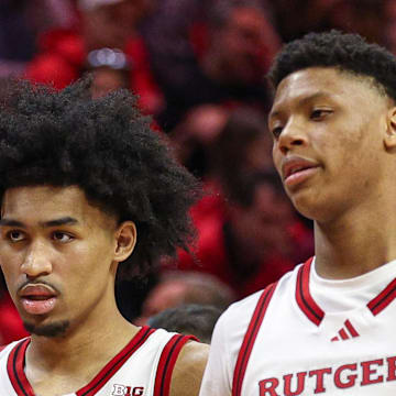 Mar 9, 2025; Piscataway, New Jersey, USA; Rutgers Scarlet Knights guard Dylan Harper (2) and Rutgers Scarlet Knights guard Ace Bailey (4) during a time out during the second half against the Minnesota Golden Gophers at Jersey Mike's Arena. Mandatory Credit: Vincent Carchietta-Imagn Images
