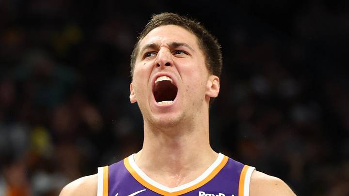 Feb 26, 2026; Phoenix, Arizona, USA; Phoenix Suns forward Royce O'Neale (00) celebrates with guard Collin Gillespie (12) against the Los Angeles Lakers in the second half at Mortgage Matchup Center. Mandatory Credit: Mark J. Rebilas-Imagn Images