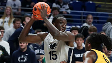 Penn State Nittany Lions forward Kachi Nzeh controls the ball against Coppin State Eagles during a non-conference game. 