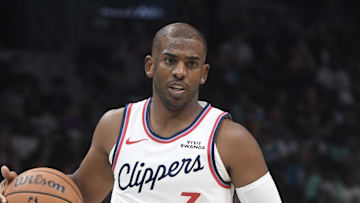 Nov 22, 2025; Charlotte, North Carolina, USA; Los Angeles Clippers guard Chris Paul (3) drives in during the second half against the Charlotte Hornets at the Spectrum Center. Mandatory Credit: Sam Sharpe-Imagn Images