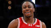 Wisconsin Badgers guard John Blackwell (25) celebrates as the clock runs down Saturday, Dec. 14, 2024, during the NCAA men’s basketball game between the Butler Bulldogs and the Wisconsin Badgers at Gainbridge Fieldhouse in Indianapolis. Wisconsin Badgers won 83-74.