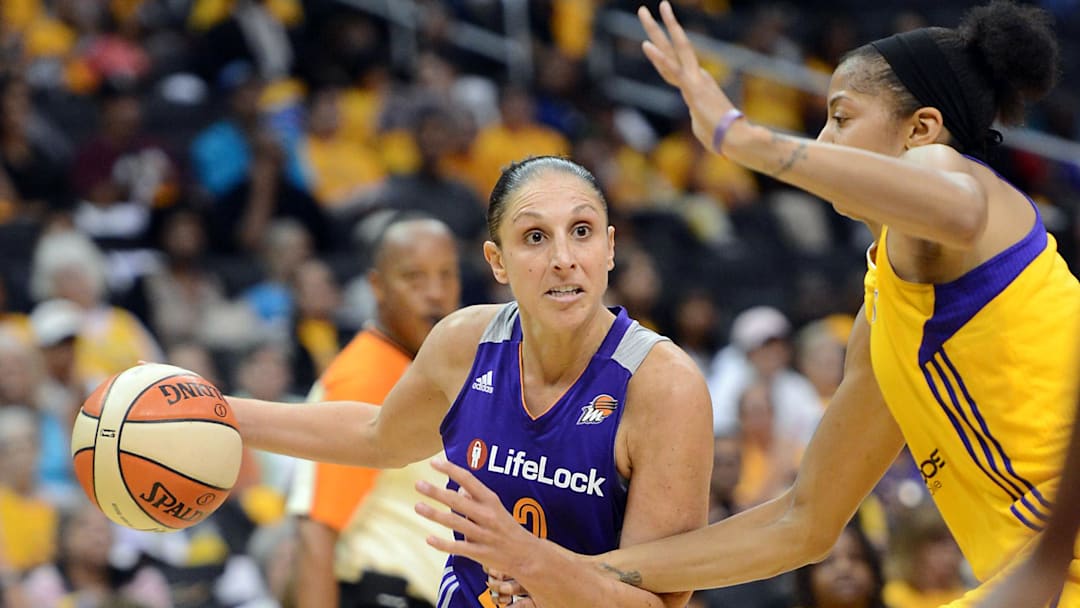 Sep 19, 2013; Los Angeles, CA, USA;  Los Angeles Sparks center Candace Parker (3) guards Phoenix Mercury guard Diana Taurasi (3) in the second half of game 1 of the Western Conference semi-finals at Staples Center. Phoenix won 86-75. Mandatory Credit: Jayne Kamin-Oncea-Imagn Images