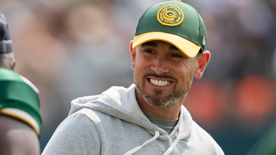 Green Bay Packers head coach Matt LaFleur shares a laugh with linebacker Kenneth Odumegwu (56) during practice on Monday, July 31, 2023, at Ray Nitschke Field in Green Bay, Wis. Tork Mason/USA TODAY NETWORK-Wisconsin