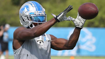 Former Detroit Lions receiver Quintez Cephus catches balls after the team's first padded practice of preseason camp Aug. 1, 2022 in Allen Park.