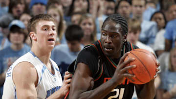 Jan 31, 2007, Chapel Hill, NC, USA; Miami Huricanes (21) Dwayne Clemente with the ball as North Carolina Tar Heels (50) Tyler Hansbrough defends in the Tar Heels 105-64 victory over the Hurricanes at the Dean E. Smith Center in Chapel Hill, NC. Mandatory Credit: Bob Donnan-Imagn Images Copyright © 2007 Bob Donnan