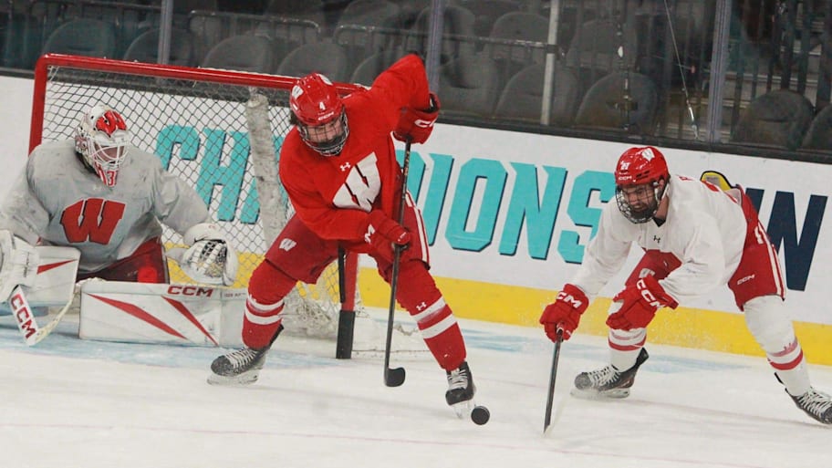Ben Dexheimer (center) and Finn Brink (right) prepare for the Frozen Four in Las Vegas.