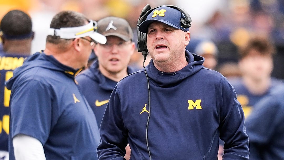 Michigan offensive coordinator Chip Lindsey talks to players on the sideline during the first half of the spring game at Michigan Stadium in Ann Arbor on Saturday, April 19, 2025.