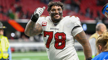 Dec 10, 2023; Atlanta, Georgia, USA; Tampa Bay Buccaneers offensive tackle Tristan Wirfs (78) celebrates after a victory against the Atlanta Falcons at Mercedes-Benz Stadium. Mandatory Credit: Brett Davis-Imagn Images
