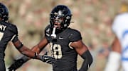 Nov 2, 2024; West Point, New York, USA; Army Black Knights linebacker Elo Modozie (18) celebrates a sack against the Air Force Falcons during the second half at Michie Stadium. Mandatory Credit: Danny Wild-Imagn Images