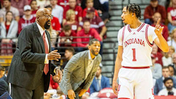Indiana coach Mike Woodson talks with point guard Myles Rice (1) on the sidelines at Assembly Hall in Bloomington, Ind.