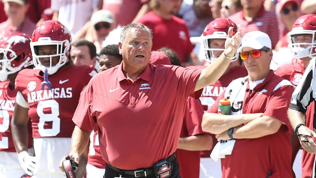Sep 10, 2022; Fayetteville, Arkansas, USA; Arkansas Razorbacks head coach Sam Pittman reacts toward an official after a play in the second quarter against the South Carolina Gamecocks at Donald W. Reynolds Razorback Stadium. Mandatory Credit: Nelson Chenault-Imagn Images