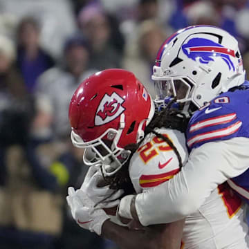 Kansas City Chiefs running back Kareem Hunt gets taken down from behind by Buffalo Bills defensive end Greg Rousseau during first half action against the Kansas City Chiefs at Highmark Stadium in Orchard Park on Nov. 2, 2025.