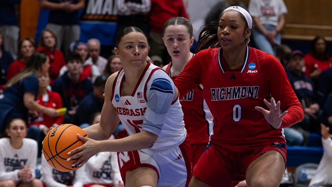 Nebraska dual-sport student-athlete Kennadi Williams scored a run against Michigan on Sunday and then scored two points against Richmond on Wednesday.