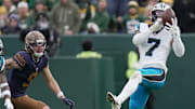 Carolina Panthers safety Tre'von Moehrig (7) intercepts a pass thrown by Green Bay Packers quarterback Jordan Love during the third quarter of their game Sunday, November 2, 2025 at Lambeau Field in Green Bay, Wisconsin.