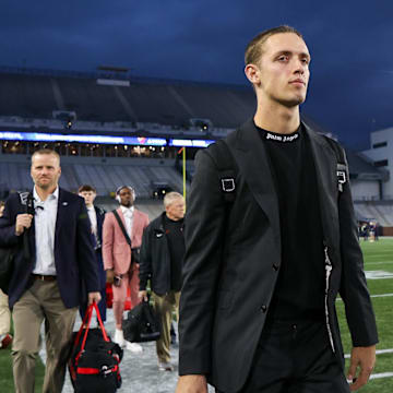 Nov 25, 2023; Atlanta, Georgia, USA; Georgia Bulldogs quarterback Carson Beck (15) walks into Bobby Dodd Stadium at Hyundai Field before a game against the Georgia Tech Yellow Jackets. Mandatory Credit: Brett Davis-Imagn Images

