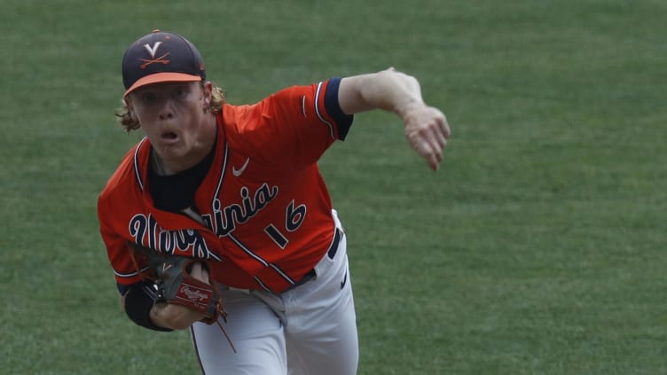 Virginia Cavaliers pitcher Andrew Abbott (16) throws.