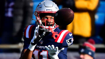 Former New England Patriots wide receiver Tyquan Thornton (11) warms up before the start of a game against the Cincinnati Bengals at Gillette Stadium.