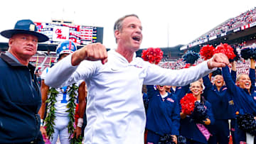 Oct 25, 2025; Norman, Oklahoma, USA;  Ole Miss Rebels head coach Lane Kiffin celebrates with fans after the game against the Oklahoma Sooners at Gaylord Family-Oklahoma Memorial Stadium. Mandatory Credit: Kevin Jairaj-Imagn Images