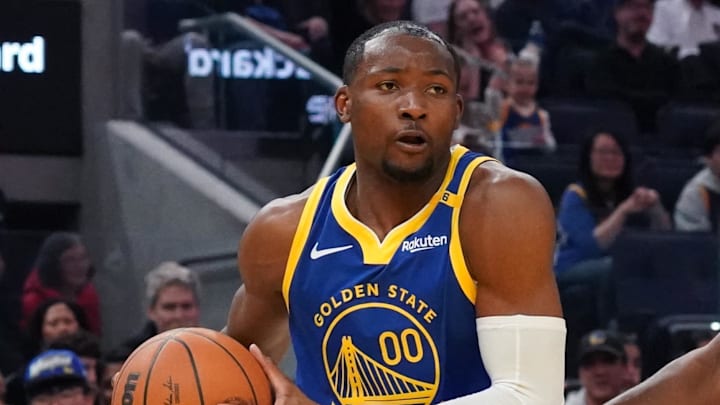 Golden State Warriors forward Jonathan Kuminga drives to the basket with the ball. Golden State Warriors forward Jonathan Kuminga drives to the basket with the ball.