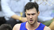 Jan 31, 2024; Cleveland, Ohio, USA; Detroit Pistons forward Danilo Gallinari (12) reacts after a play against Cleveland Cavaliers guard Max Strus (1) in the fourth quarter at Rocket Mortgage FieldHouse. Mandatory Credit: David Richard-Imagn Images