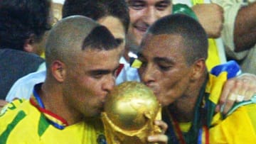 Brazil's forward Ronaldo (L) and midfielder Gilber